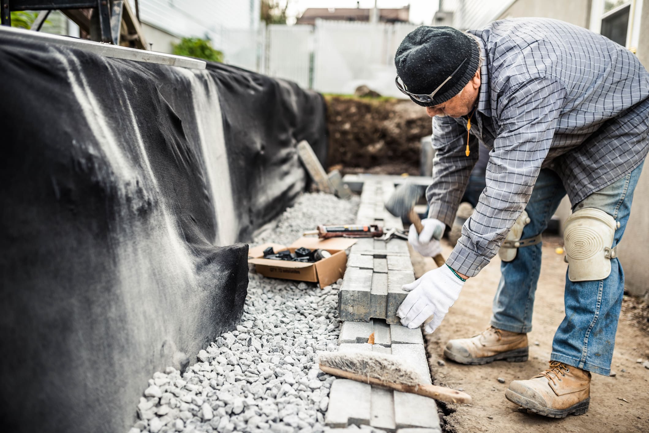 Skills and Expertise for DIY vs. professional retaining wall installation